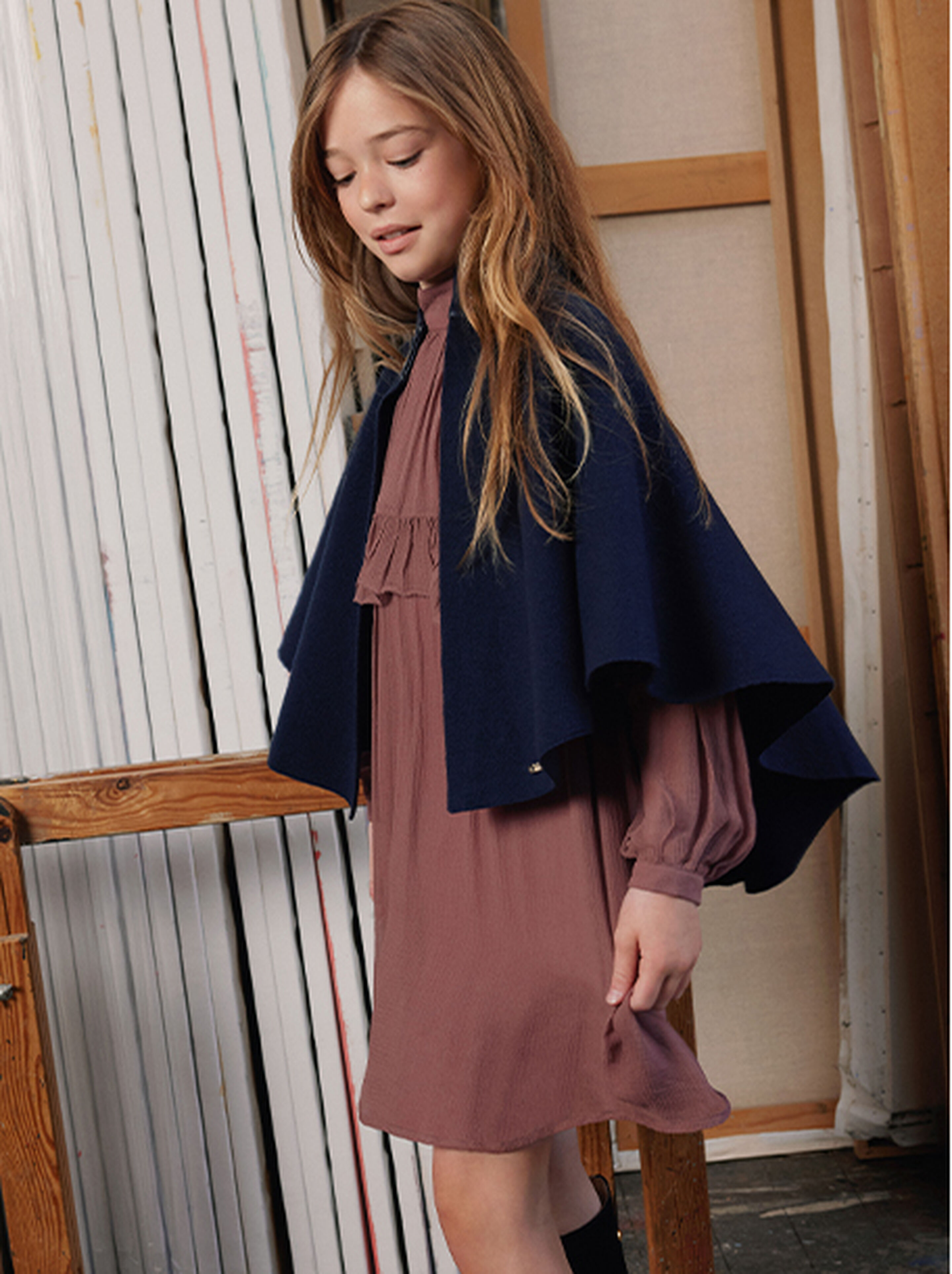 Colour moodboard for Winter 2025 showcasing timeless neutrals and rich deep blues