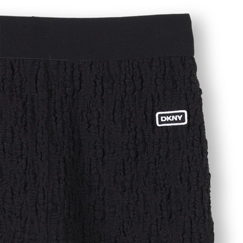 Wide embossed-look trousers DKNY 
                        GIRL