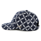 Satin-look patterned cap MICHAEL KORS 
                    GIRL