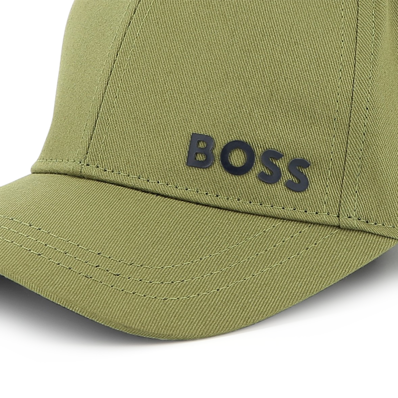 Cap with adjustable fastening